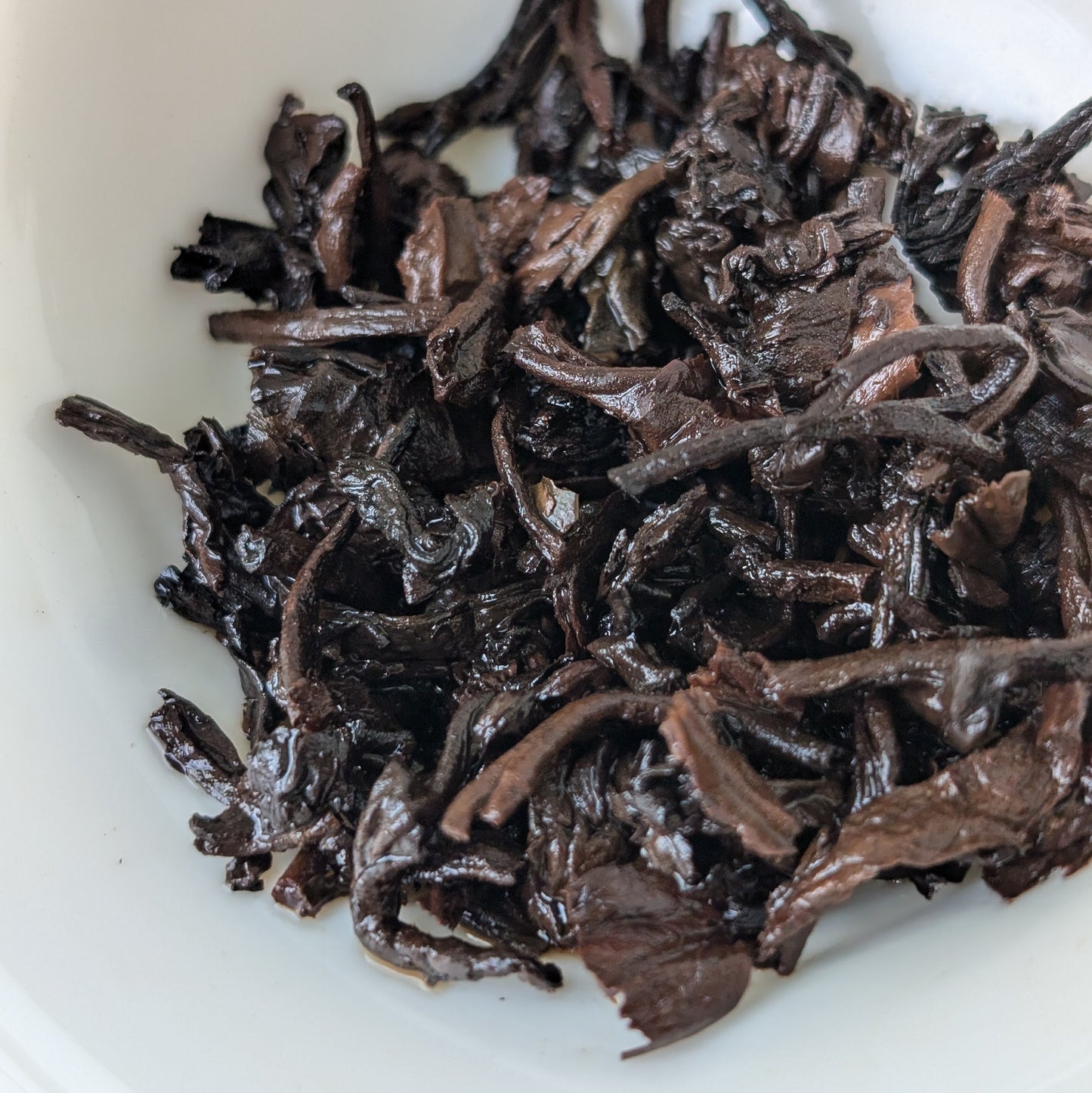 Menghai Golden Bud Ripe Pu Erh Tea Cake wet leaves