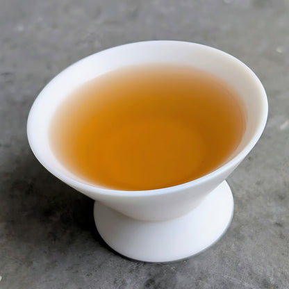tea soup, cup of Chinese white tea