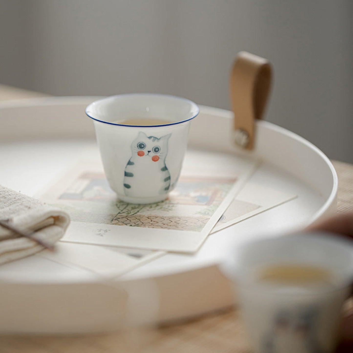 teacup on a tray, cozy small tea cup