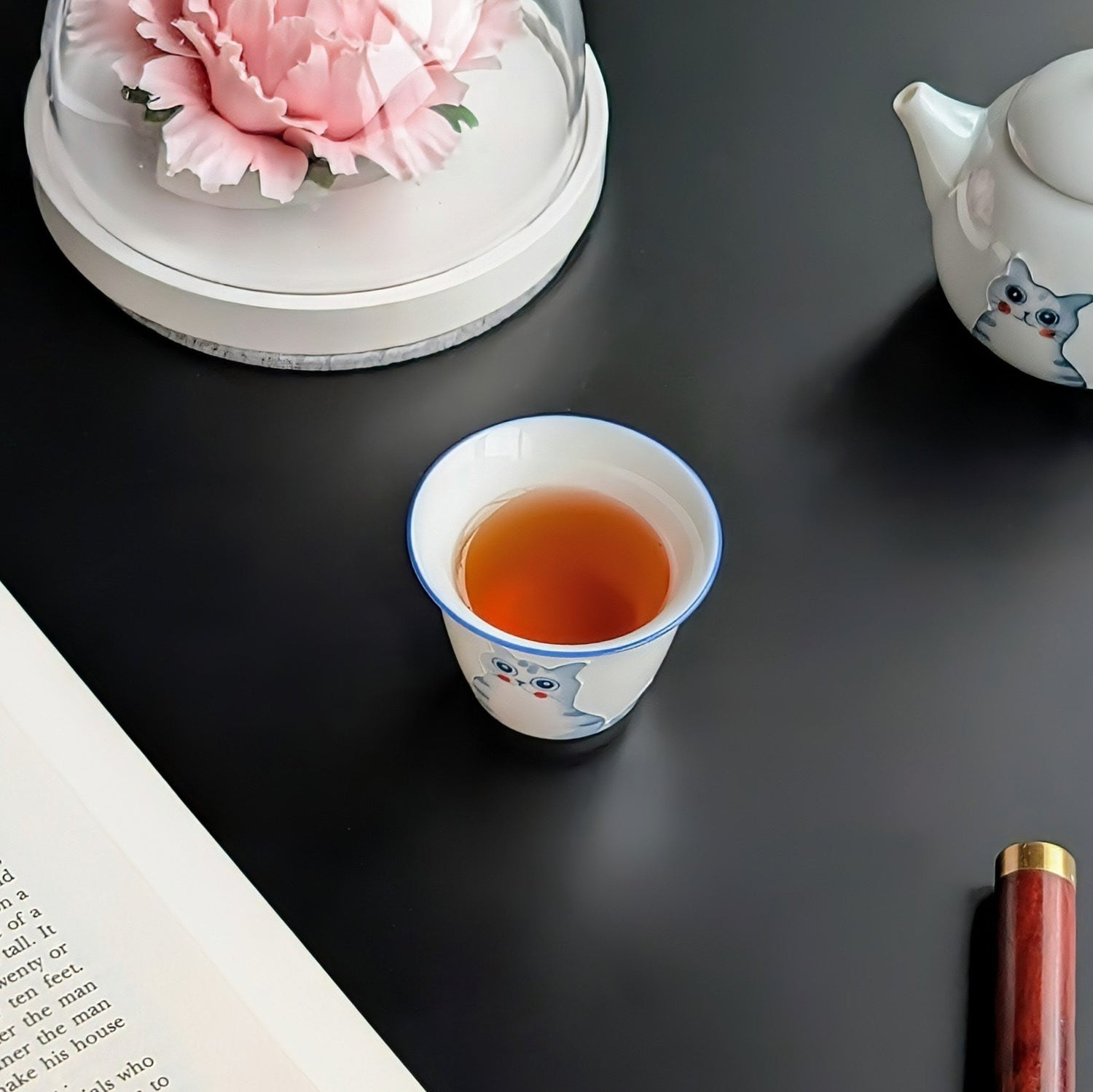 cute cat tea cup with lapsang souchong black tea
