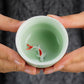 Celadon Porcelain Gongfu Tea Cup with Koi Fish