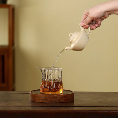 pouring tea with yixing teapot