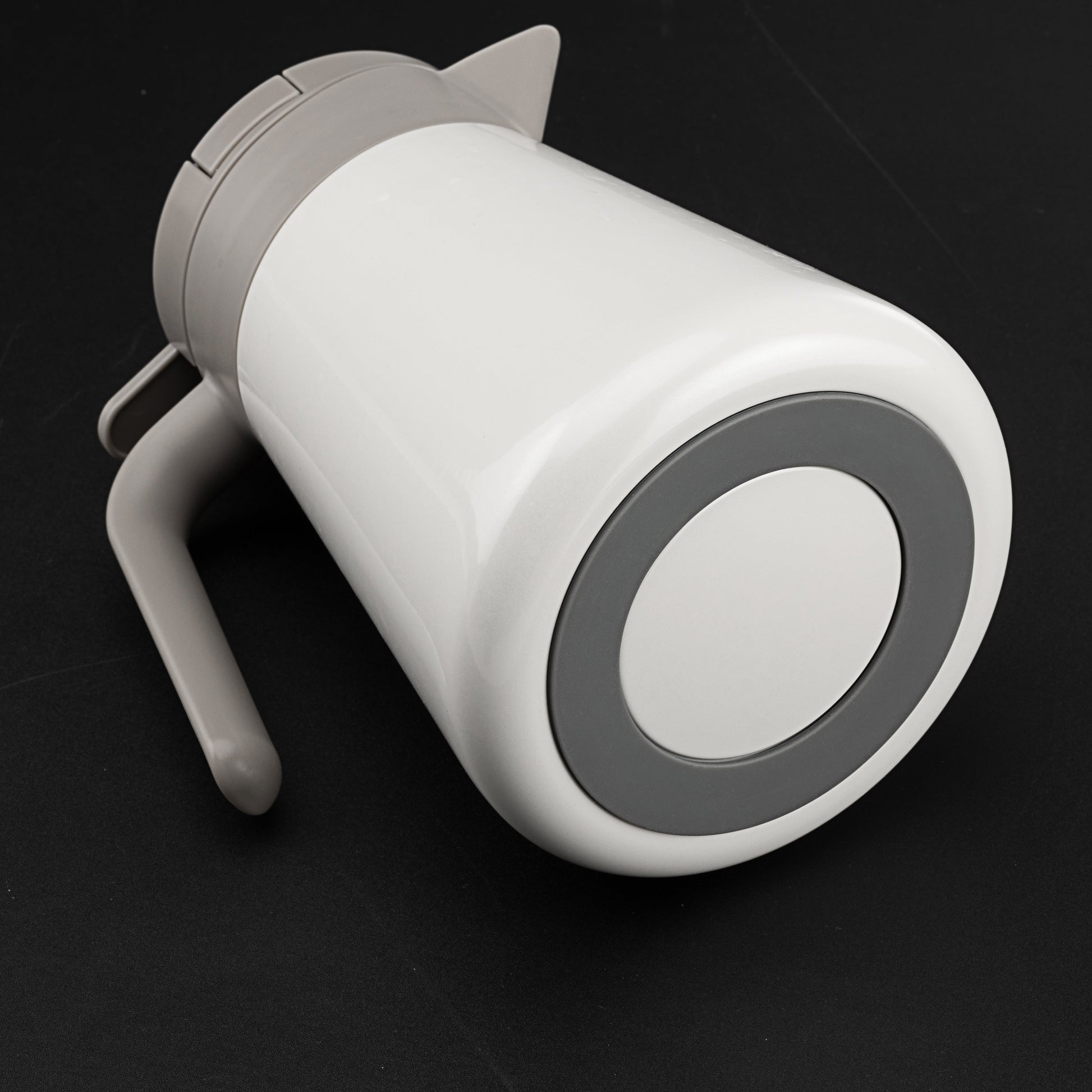 a thermos jug featuring a rubber bottom