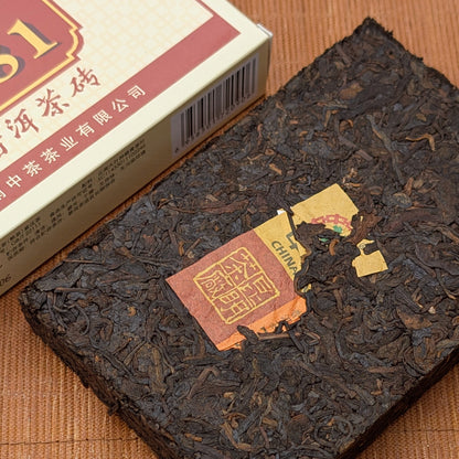 a brick of chinese ripe pu erh 
