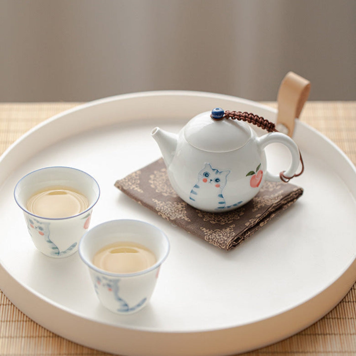 porcelain teapot with cups tea set
