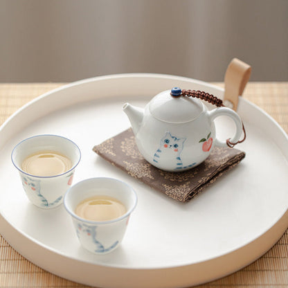porcelain teapot with cups tea set