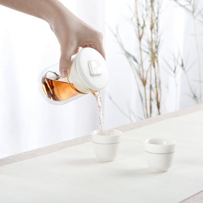 pouring a cup of chinese black tea 