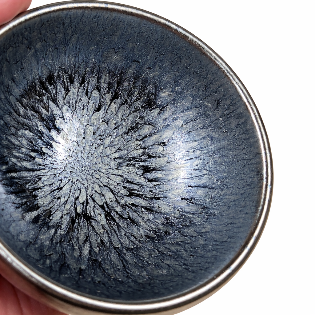 detail of a blue glazed tenmoku tea cup