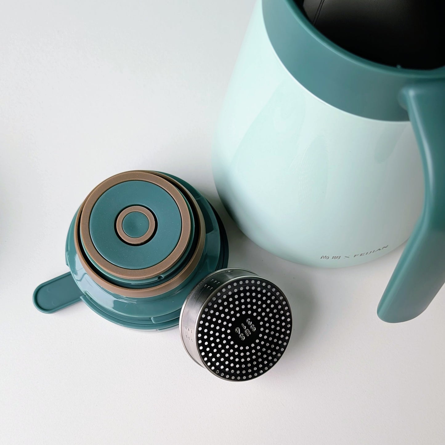 filter for a thermos insulated vacuum jug