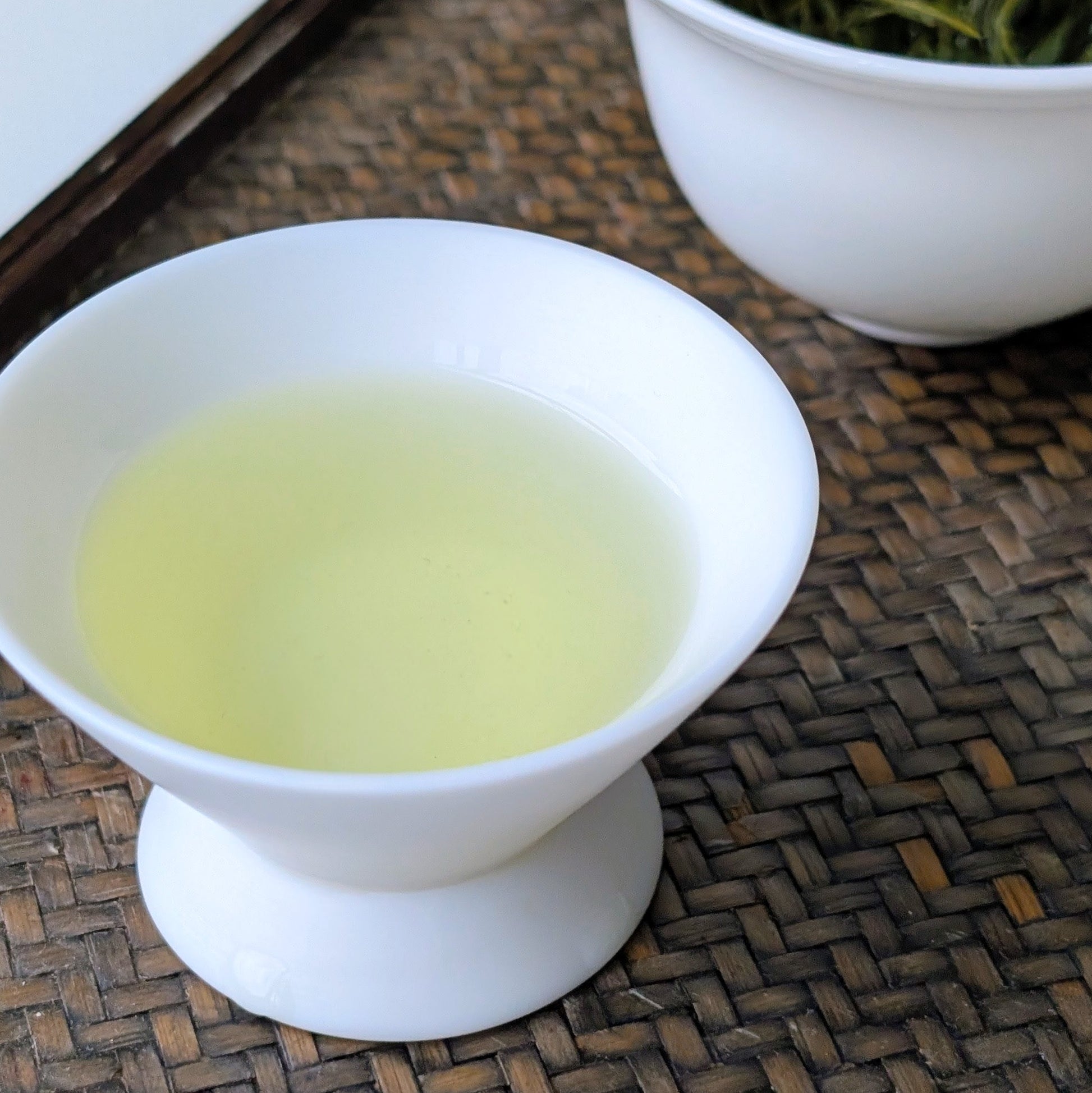 cup of wild xinyang maojian chinese green tea