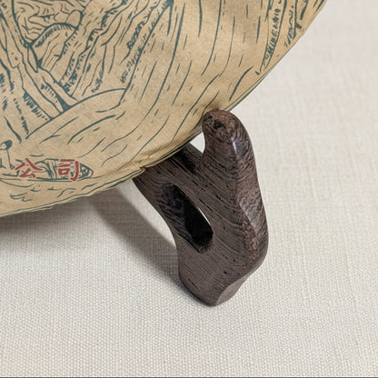  detail of the ornamental stand for tea cakes and plates