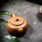 small yellow yixing teapot