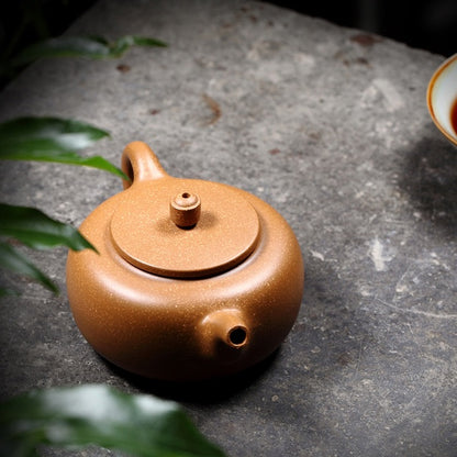 small yellow yixing teapot